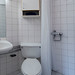 En suite includes a sink, mirror, toilet and shower