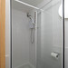 En suite walk-in shower with door