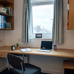 Rooms have a full-length desk, chair and plenty of storage