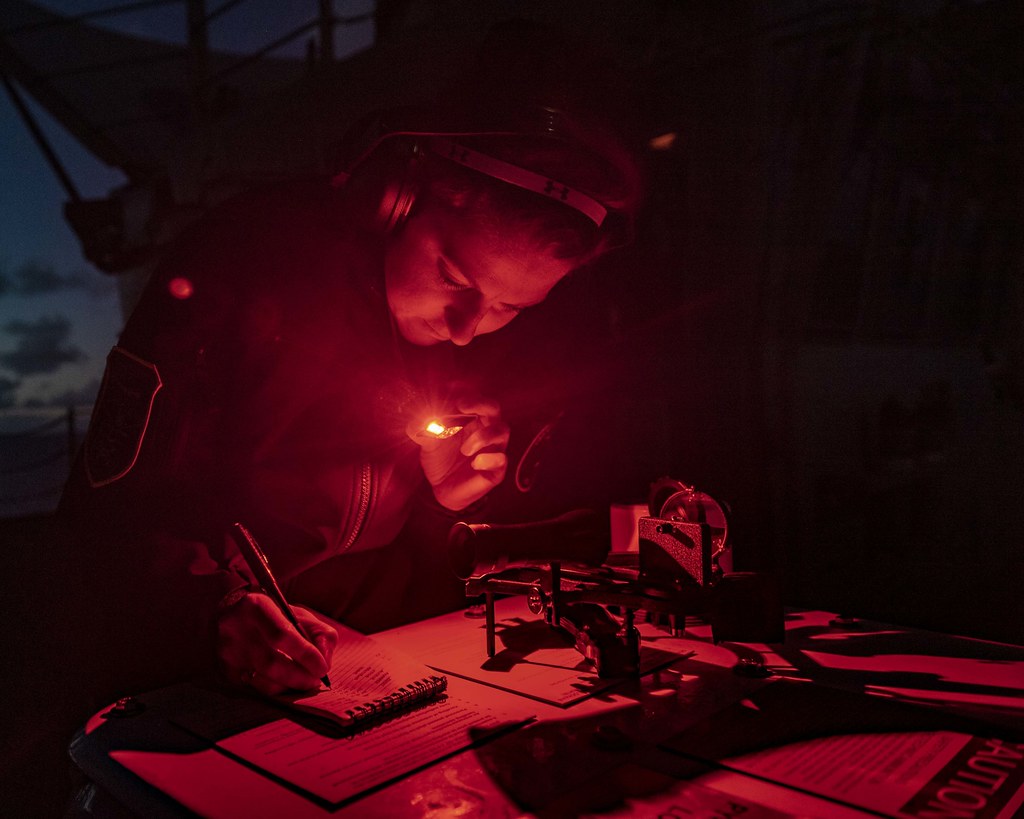 Lt. Cmdr. Caroline Stanton conducts celestial navigation aboard USS Essex (LHD 2).