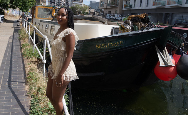 DSC_5689a Nagat African American Model from Iowa in Cream Lace Hot Pants Romper Playsuit and Snake Skin Shoes with Long Braids Photoshoot on Location Dutch Barge MV Bestevaer Regent's Canal Towpath Shoreditch London