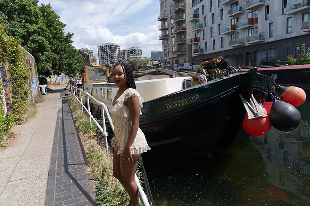 DSC_5689 Nagat African American Model from Iowa in Cream Lace Hot Pants Romper Playsuit and Snake Skin Shoes with Long Braids Photoshoot on Location Dutch Barge MV Bestevaer Regent's Canal Towpath Shoreditch London