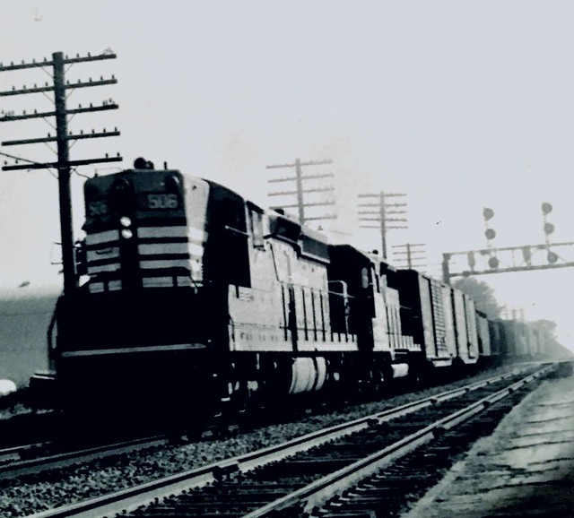 Burlington Route SD.#509 and Geep pulling a fast freight that summer of 1967 in Galva IL.
