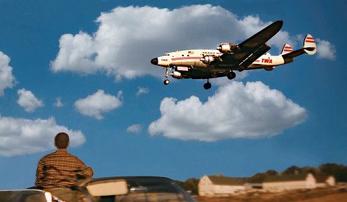 airliners pistonengineaircraft lockheed1049constellation teenager clouds 1964 slideexposure digitalscan