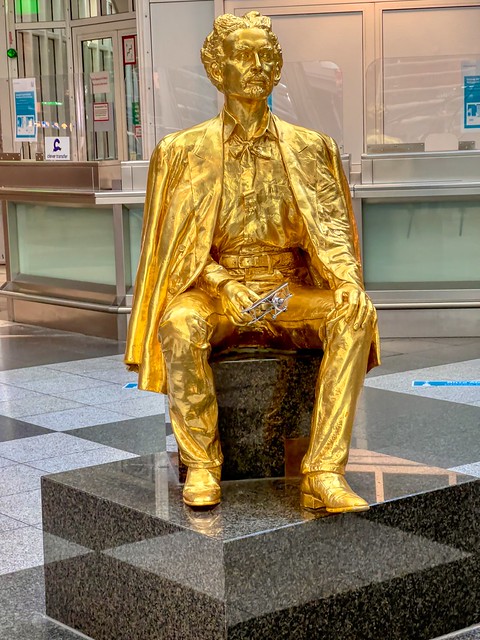Golden sculpture of King Ludwig II at Munich airport in Bavaria, Germany