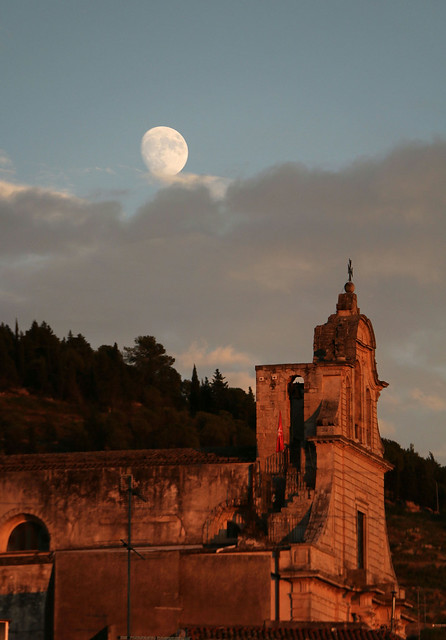 moonrise upon church at red sunset