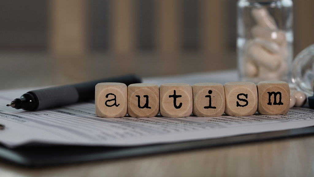 Diagnosis autism - image of clipboard with the word autism displayed.