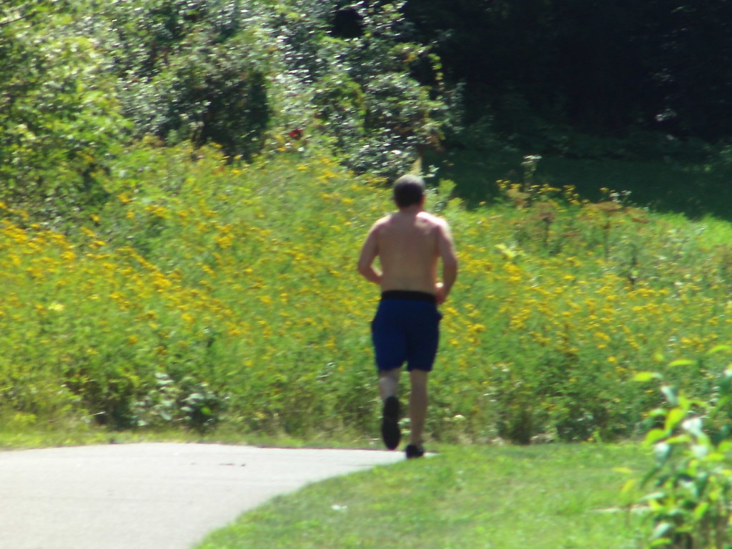 Back of Shirtless Man on Trail