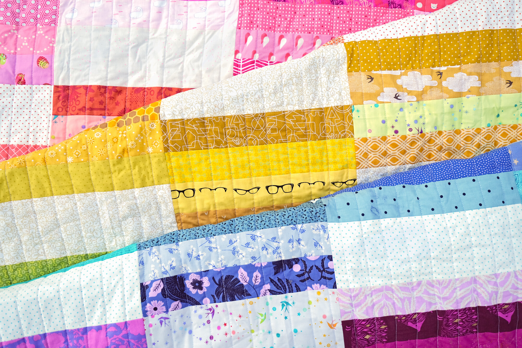 A Scrappy Rainbow Hannah Quilt - Kitchen Table Quilting
