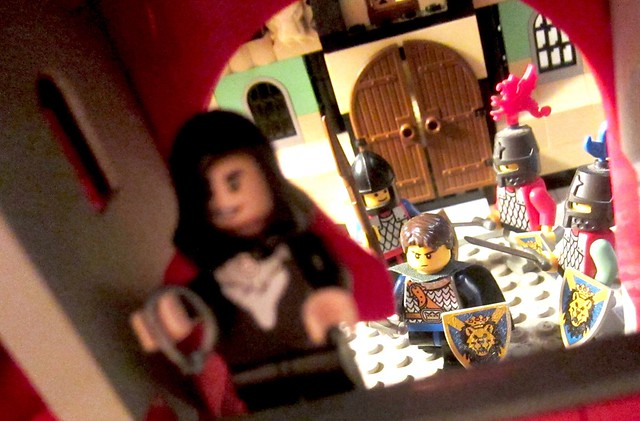 Classic Castle: a thief hurries through the town alleys with a stolen necklace in his hand closely followed by the city sheriff and his knighs  (afol Medieval Urban Moc minifigures series lion-shield photo) Hobby pic img skirmish LEGO vignette