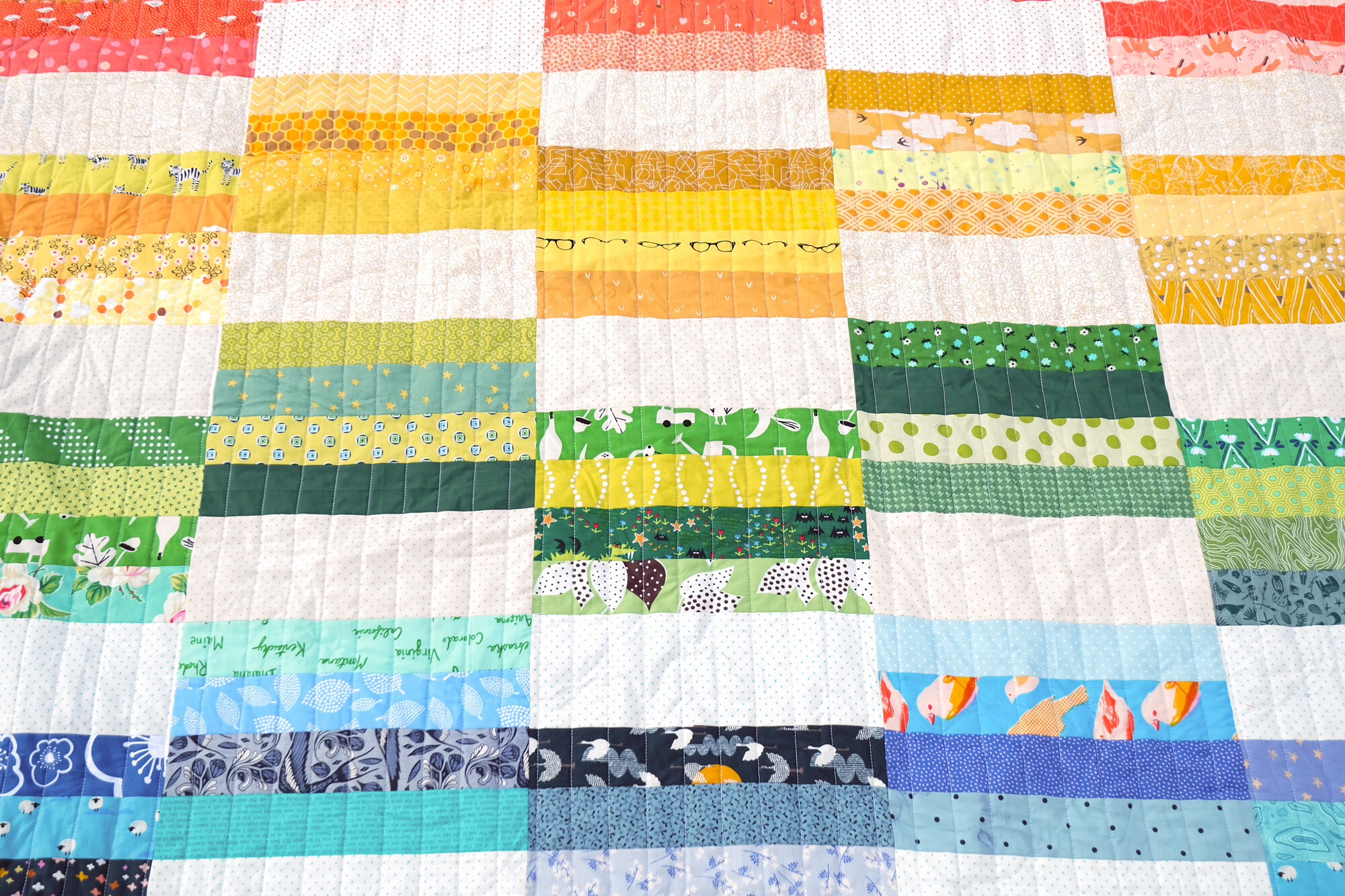 A Scrappy Rainbow Hannah Quilt - Kitchen Table Quilting
