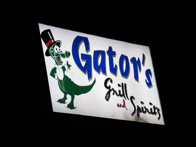 Sign for Gator's Grill and Spirits at night, U.S. 61, Burlington, Iowa