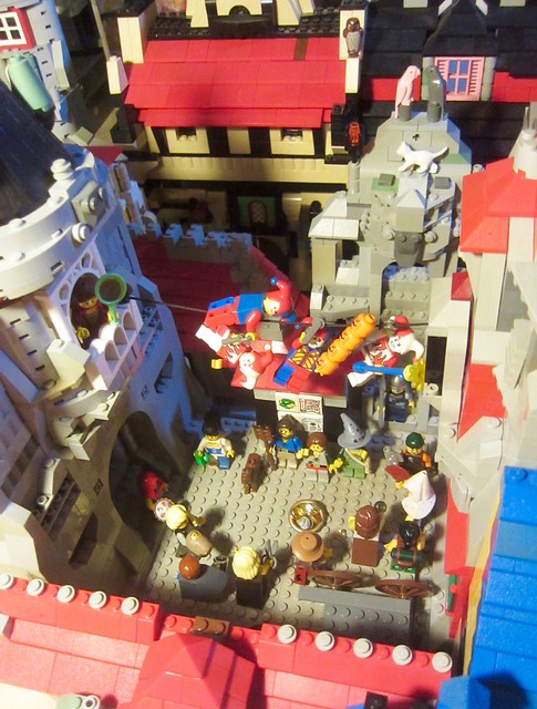 Classic Castle: Sometimes when the Court Jesters are out of pub-money they do an impromptu Trapeze performance between the building and the townsfolk love it and they can earn much gold  (Medieval AFOL MoC City Vignette LEGO Joker Jester Knave minifigs)