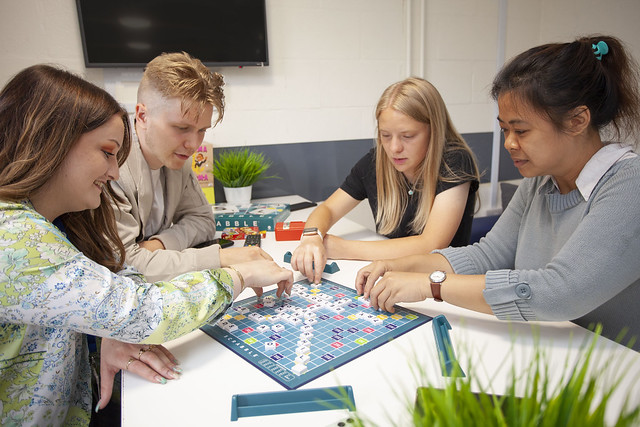 A group of students play a game together
