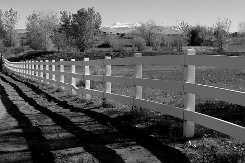 sky pasture agriculture farm nature grass agricultural field rural scene outdoors fence photography landscape scenery landscapes four corners american america southwest mountain mountains snowcapped ranch monochrome black white photographic photo art fine photoart