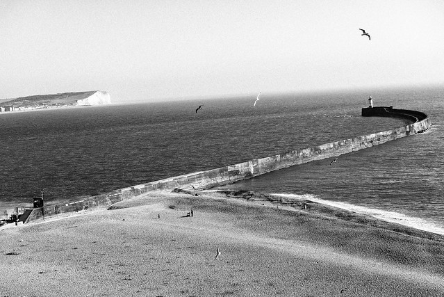 Newhaven Breakwater Lighthouse and cliffs of Seaford
