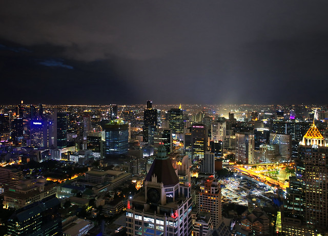 Raindrops float through the city center of Bangkok