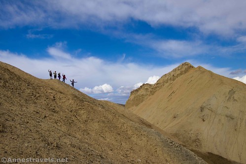 Some of my group waving from the rim of 20 Mule Team Canyon, Death Valley National Park, California
