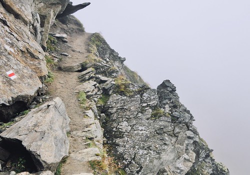 alps mountain trail hiking pazolastock piznurschalas uri switzerland fog mist