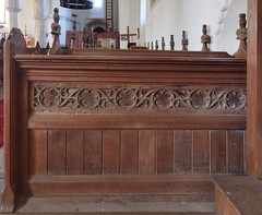 medieval tracery set into modern benches