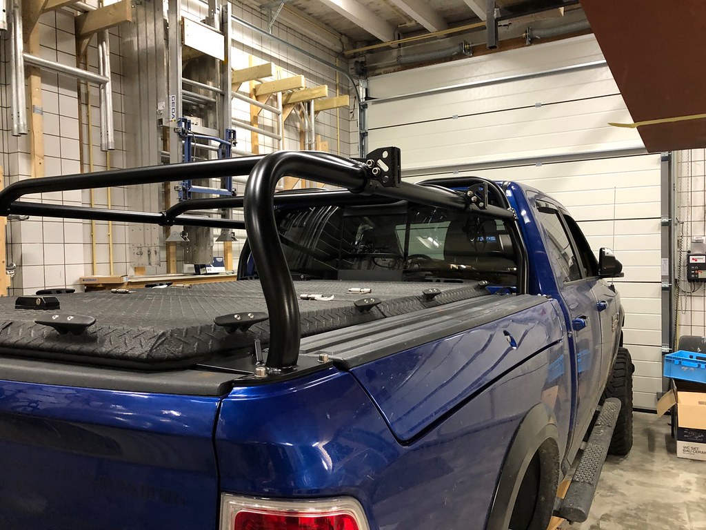 A Heavy Duty Truck Bed Cover And Custom Rack on a Dodge Ram w/RamBox