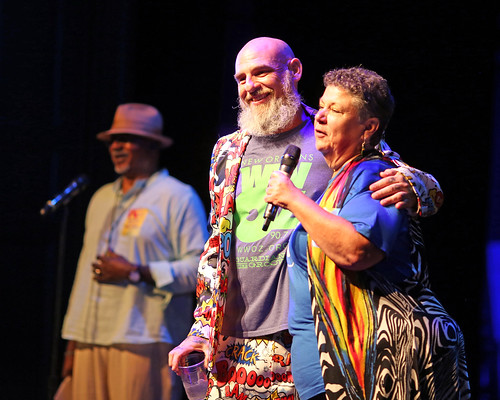 Murf Reeves and Beth Arroyo Utterback at the WWOZ Groove Gala - Sep. 1, 2022. Norman Robinson in the background. Photo by Bill Sasser.