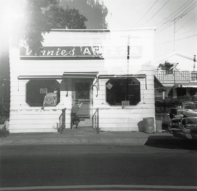 Vinnie's Apizza was so good that even dogs craved it! Taken from Merwin Avenue with a friend's 1950s Kodak Brownie loaded with a roll of 120 film. Being used to Instamatics, I forgot to advance the film and got this cool double exposure. Milford CT. 1973.