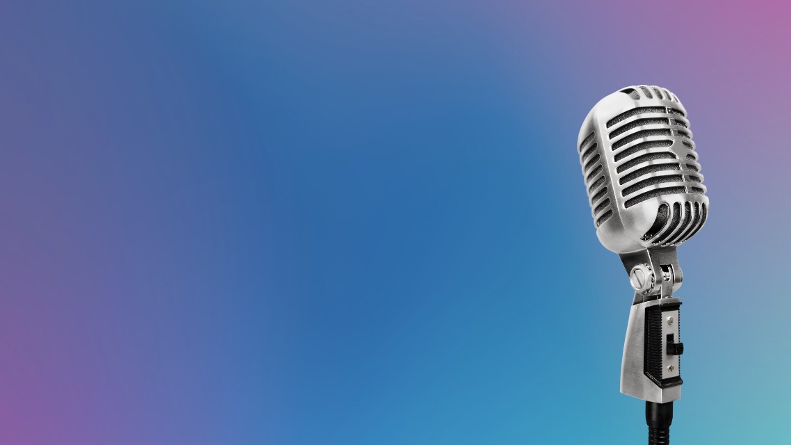 A microphone on a blue and pink background