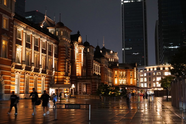 Tokyo station building at night after rain