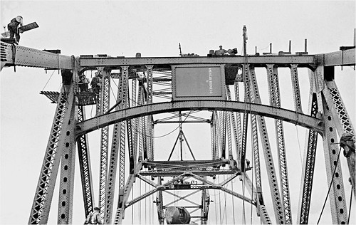 blackwhite monochrome bridge construction steel girder capecodcanal fayspoffordandthorndyke americanbridgecompany bournebridge steelworker riveter corpsofengineers sagamore infrastructure highway