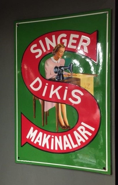 Singer Enamel Sign.