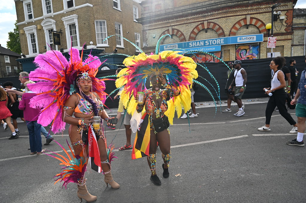 DSC_6366 Notting Hill Caribbean Carnival London Mas Players Parade Participant Performers Exotic Colourful Showgirl Costume with Ostrich Feathers Monday August 29 2022 Beautiful Stunning Girls