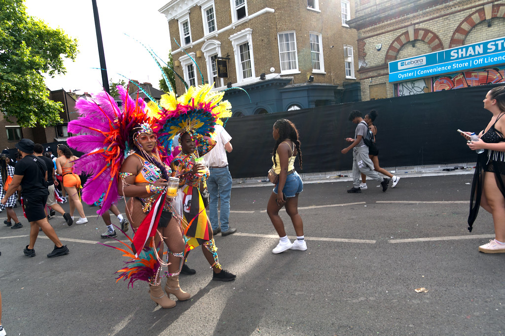 DSC_6365 Notting Hill Caribbean Carnival London Mas Players Parade Participant Performers Exotic Colourful Showgirl Costume with Ostrich Feathers Monday August 29 2022 Beautiful Stunning Girls