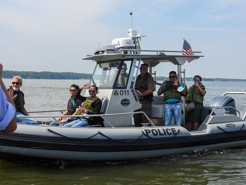 Photo of people in a police boat