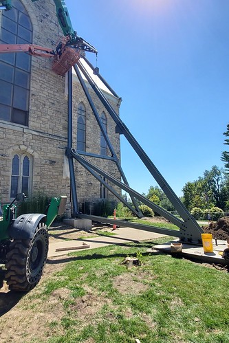 In July 2022 crews drilled 52-foot-deep moorings into the ground for three helical piers. The piers are stabilizing the roofline and west wall.