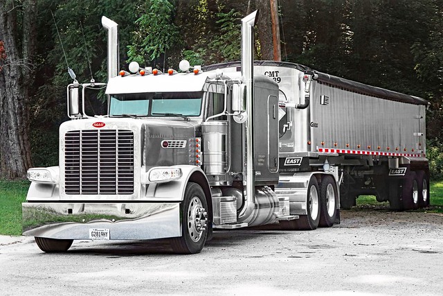 Peterbilt Tractor & its Genesis Soft Covered Top Trailer that is operated by 