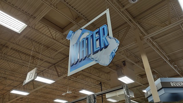 Cool new sign over the bottled water pallet/endcap