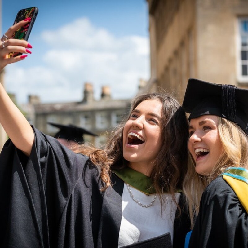 Graduates taking a selfie