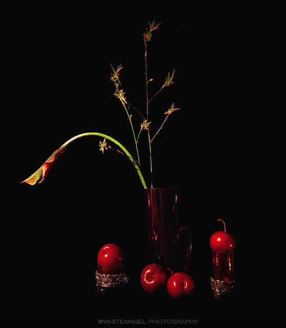 Still Life in darkness with plums & a calla.ZOOM in! ( Low-key close-up at candle's light 🔥 ) Ph. & still by #WhiteANGEL #LimitEdition 12 grps