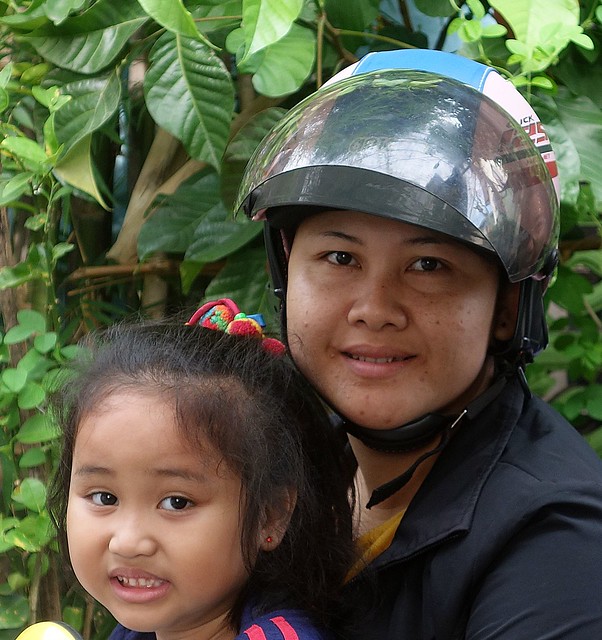 mother and daughter on a motorcycle