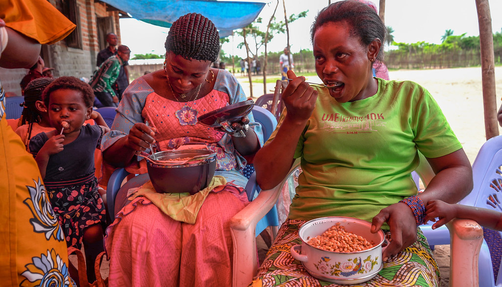 GML Lileko | Women enjoying the food prepared during the Foo… | Flickr