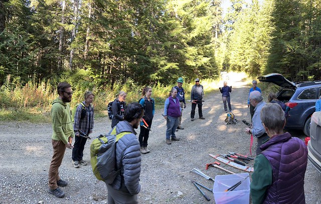 Tailgate safety briefing before doing volunteer trail work on Church Creek Trail on the Olympic National Forest with the Mountaineers