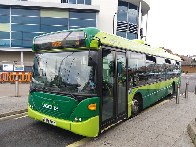 Resting at Newport Bus Station before its next journey to Ryde on route 9 is Southern Vectis 2004 (HF58 HTK) a Scania N230UB OmniCity