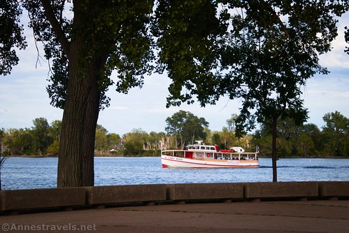 A sightseeing boat coming back to dock near the Perry Monument, Presque Isle State Park, Pennsylvania