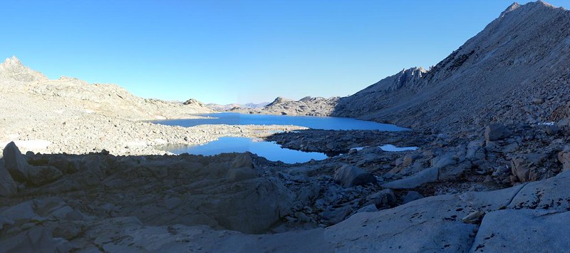 Looking back west over upper Gardiner Basin, with Lake 11407 and a closer pond, plus Mount Cotter on the right