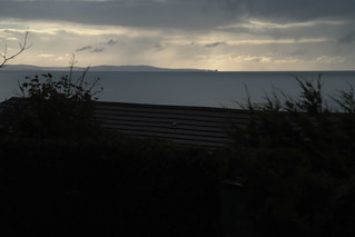 Sunrise & showers over The Gower from Penally