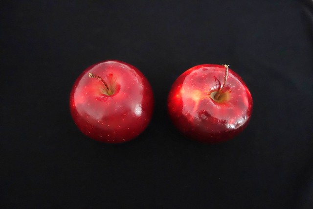 two shiny apples
