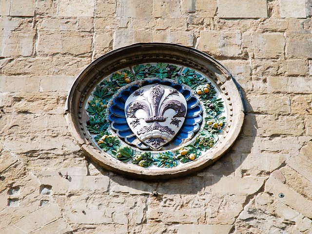 The Florence coat of arms (a Florentine Lily) on the east side of the Church of Orsanmichele