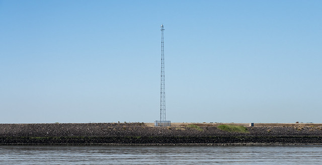 Lonely tower in minimal landscape