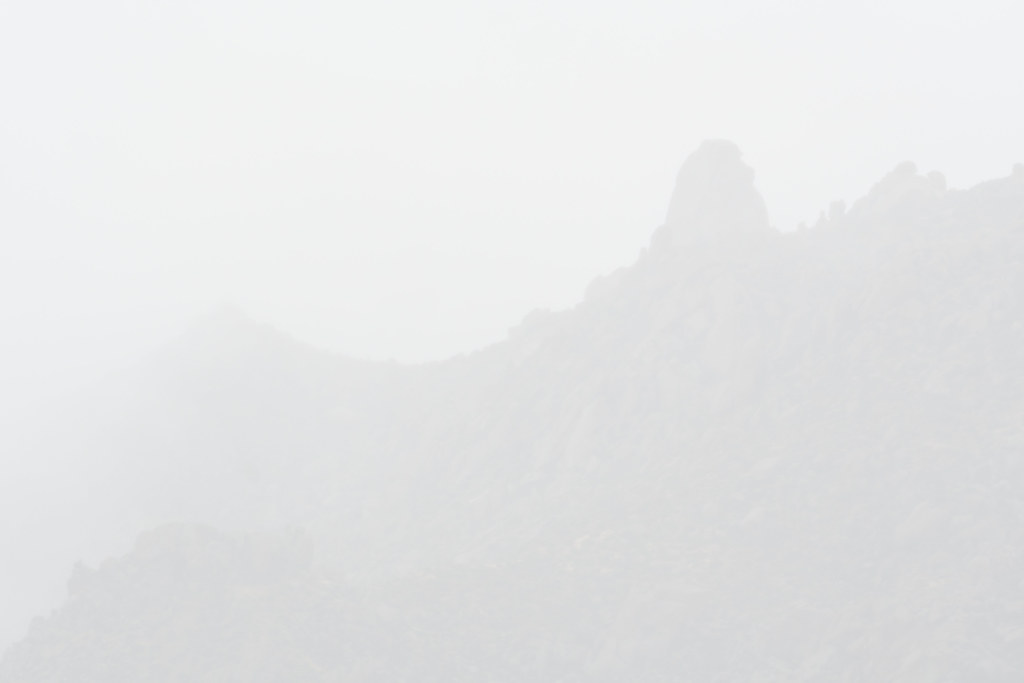 Fog and rain envelops Tom's Thumb and the McDowell Mountains in Scottsdale, Arizona on December 24, 2021. Original: _RAC2872.ARW